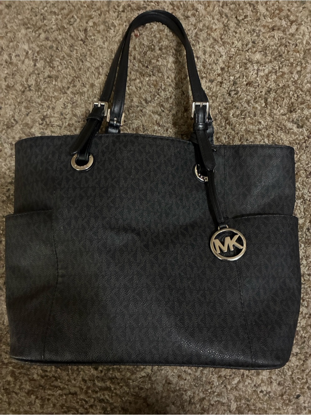Michael Kors Black Logo Jet Set tote with MK Charm and Side Pockets
